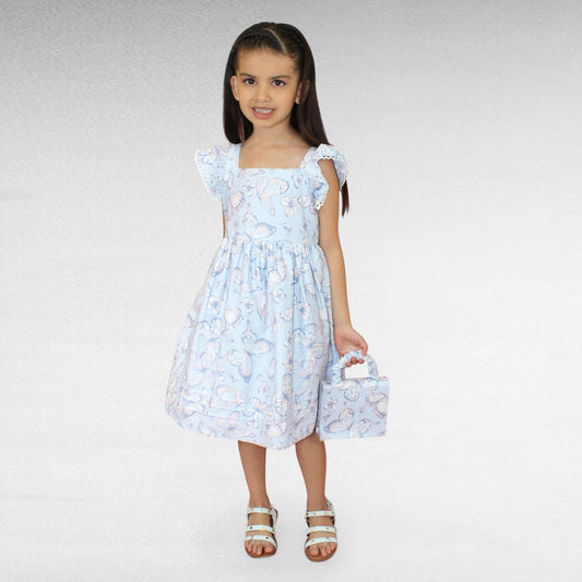 VESTIDO MARIPOSAS CON BOLSO